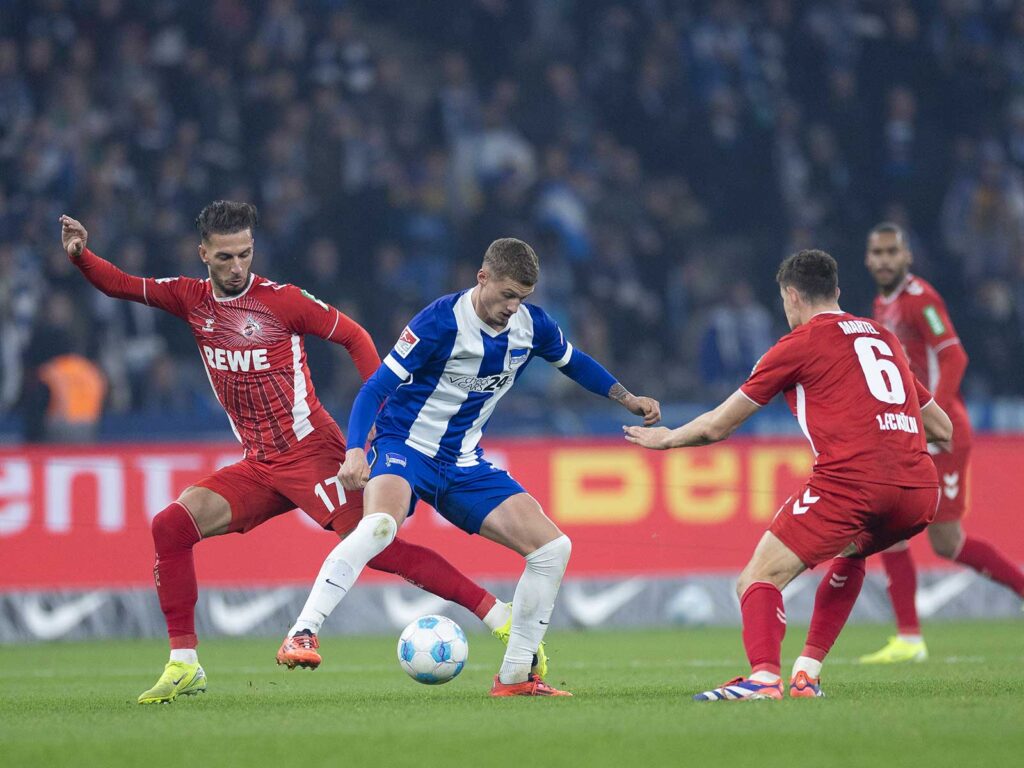 Eric Martel und Leart Pacarada vom 1. FC Köln