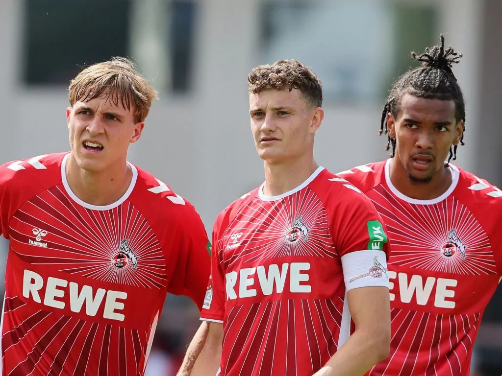 Timo Hübers, Eric Martel und Damion Downs vom 1. FC Köln