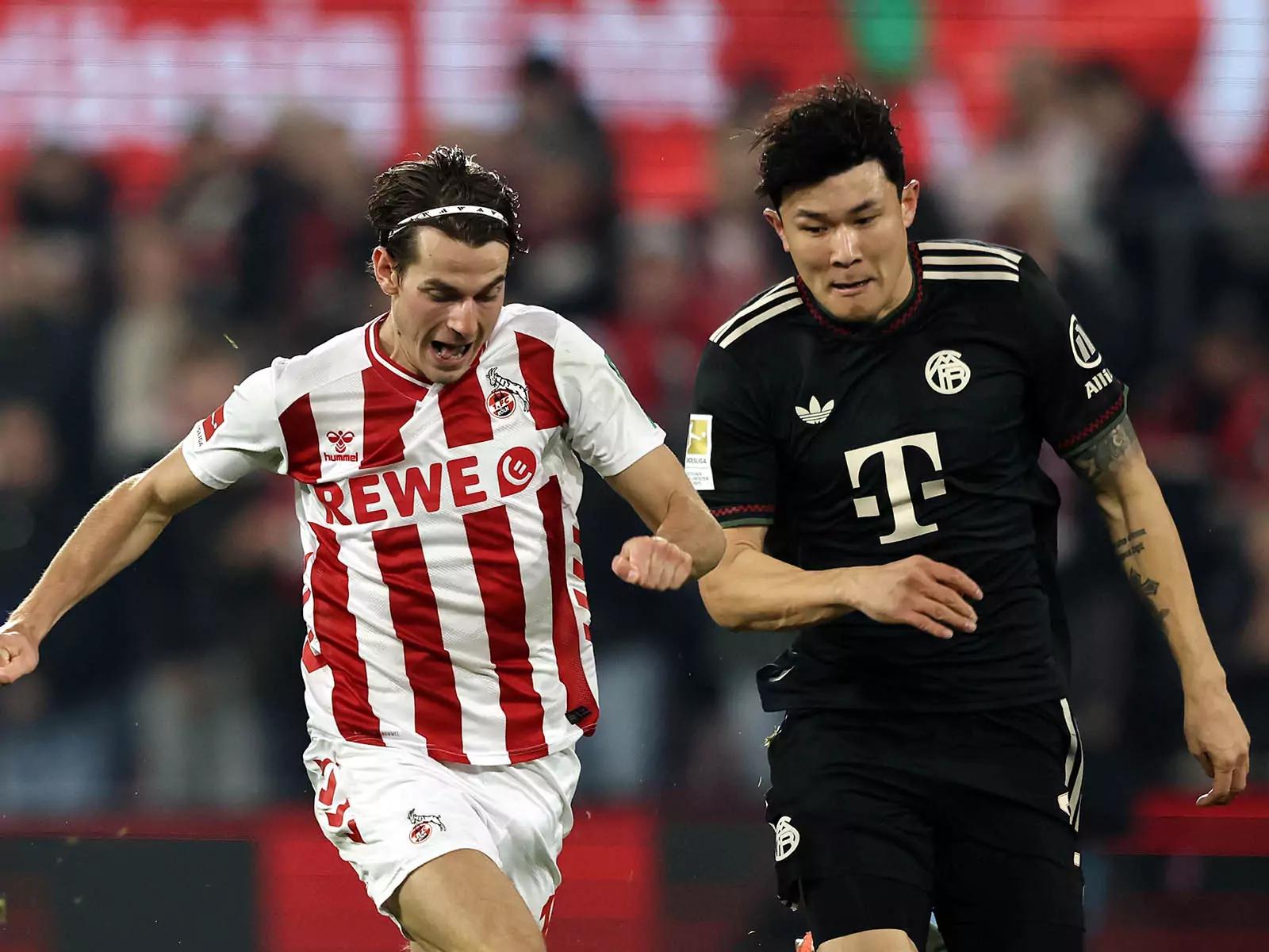 Jakub Kaminski im Zweikampf mit Min-jae Kim