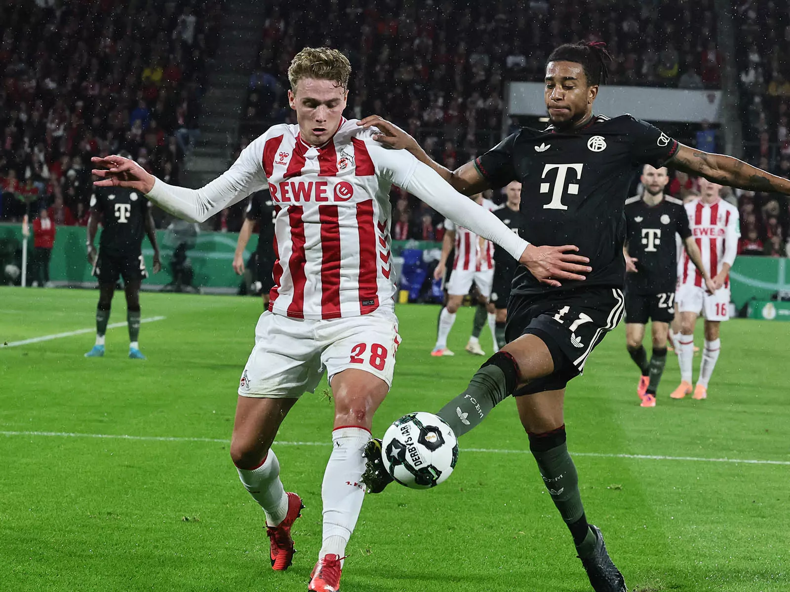 Sebastian Sebulonsen im Zweikampf mit Michael Olise